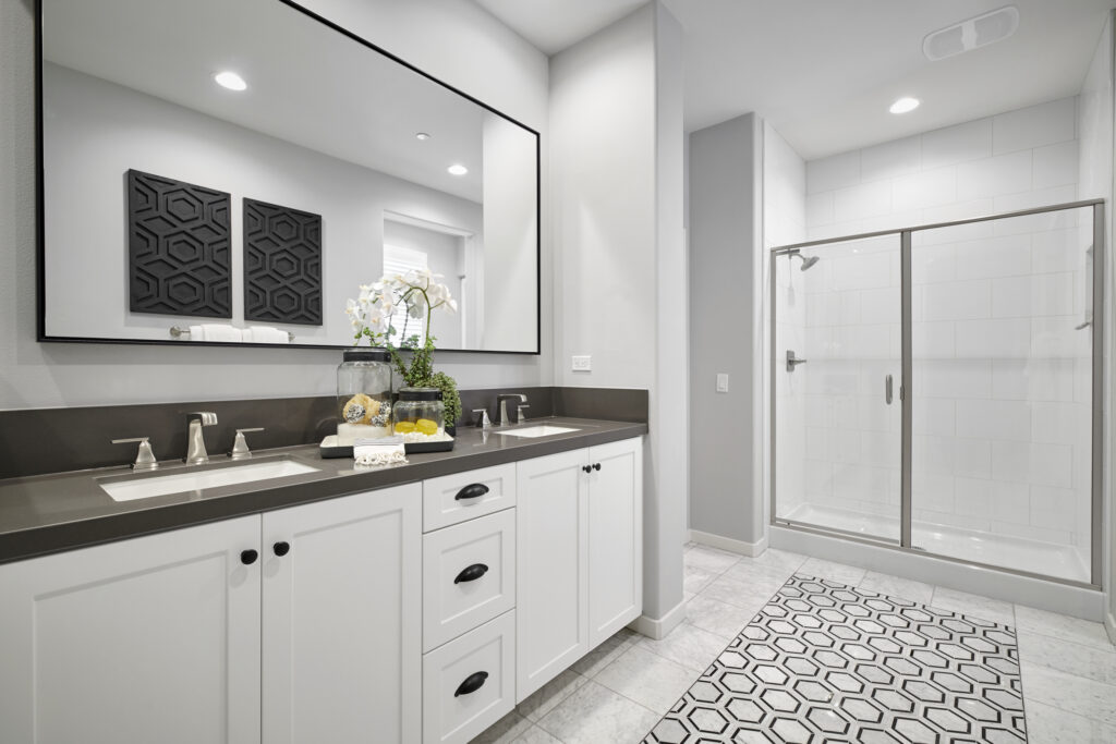 We added some interest to the floor of this spacious master bathroom with a decorative tile by Dal Tile.