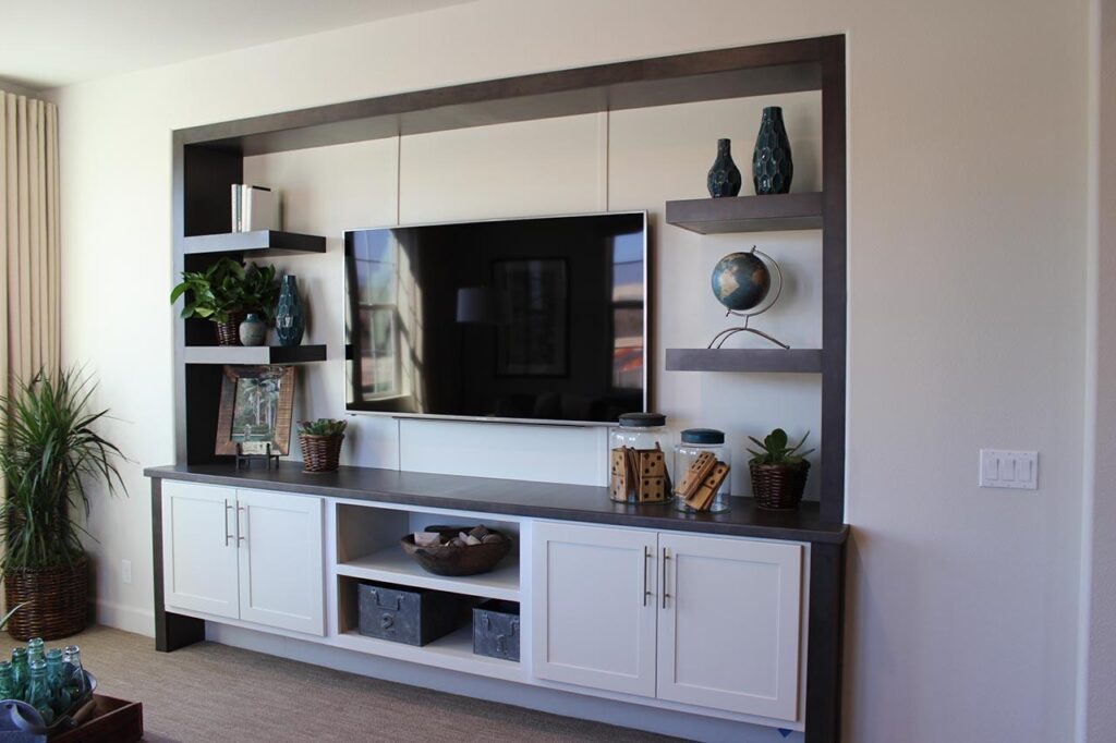 White and dark-stained wood media built-in Briosa at Esencia Plan 2 William Lyon Homes Rancho Mission Viejo